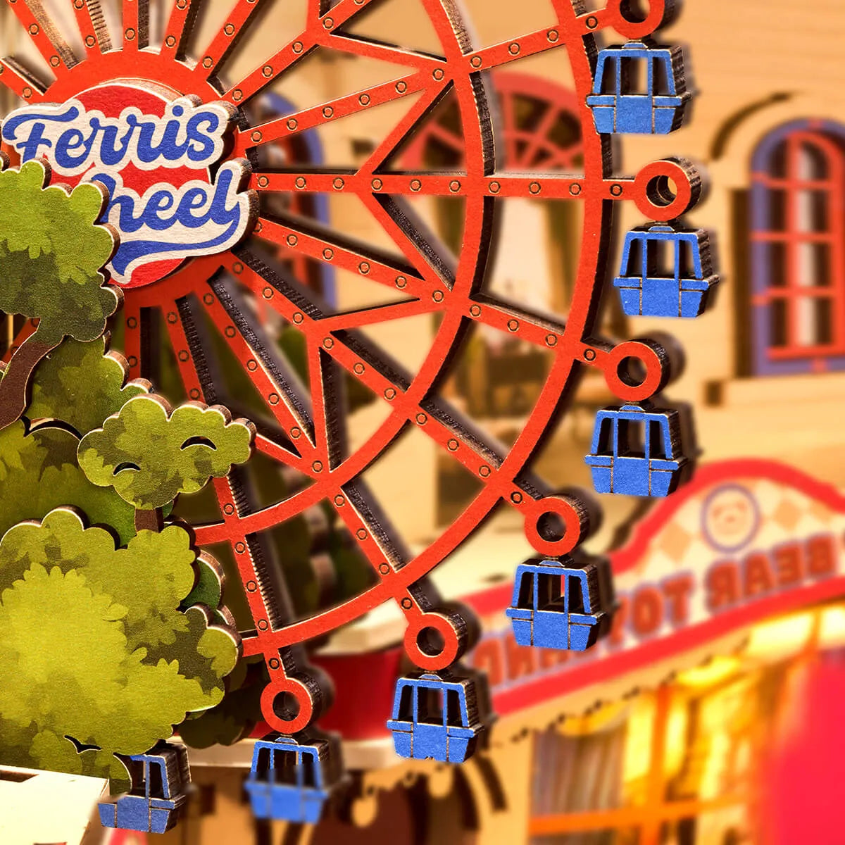 Detalle de la noria roja con cabinas azules de Fairytale Amusement Park.