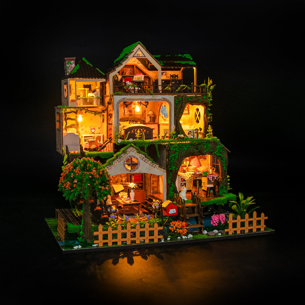 Fairy Tale Forest de Hongda, iluminada sobre fondo oscuro