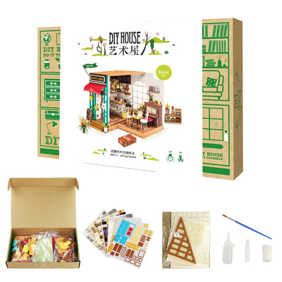 Caja abierta y componentes del kit Simon’s Coffee mostrados por el proveedor.