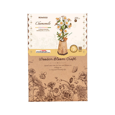 Caja del kit Chamomile con ilustraciones de flores.