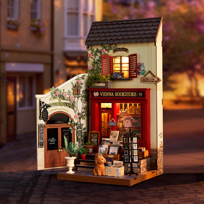 Vienna Bookstore iluminada en una ambientación de calle, con fachada roja y libros en la entrada.