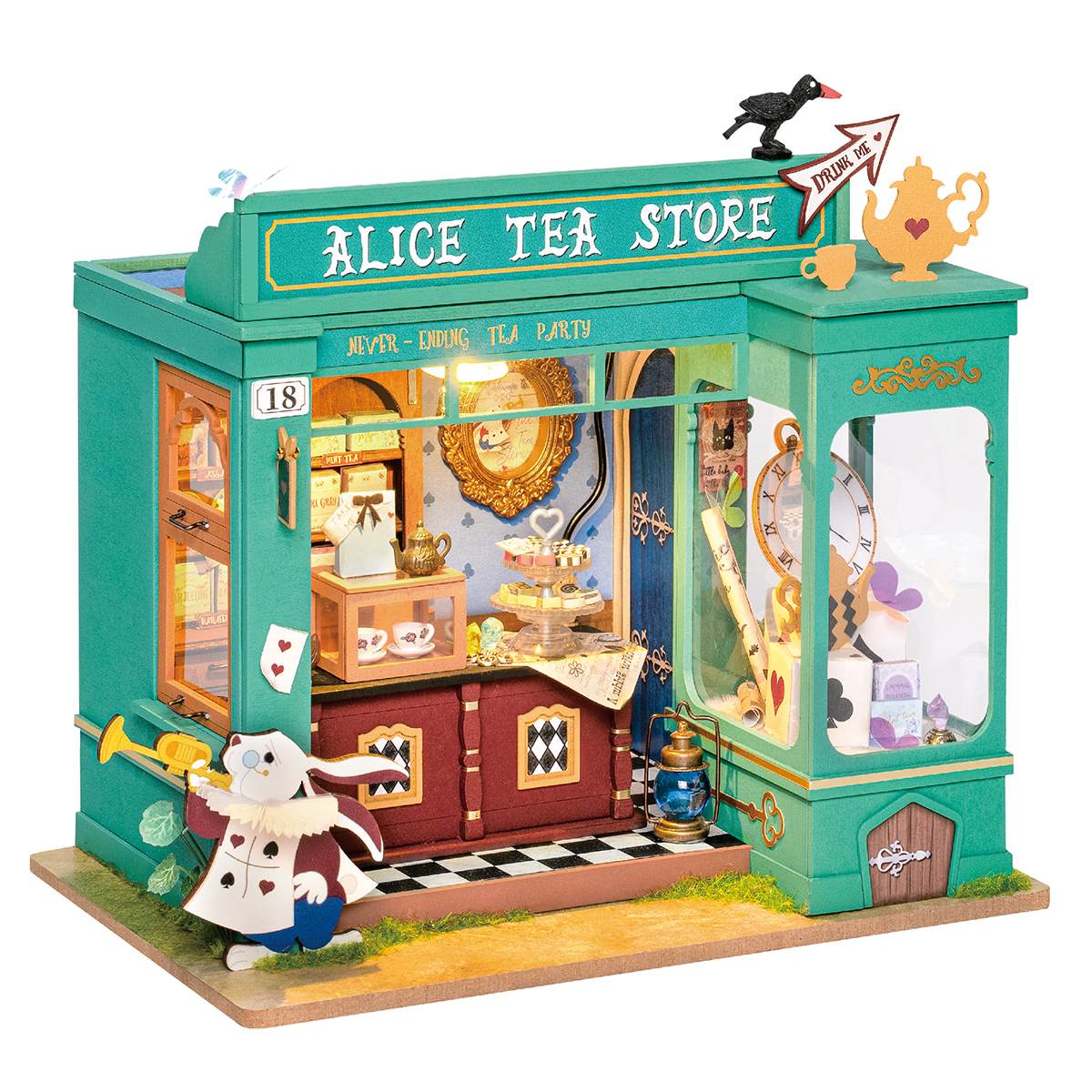 
Alice’s Tea Store montada sobre fondo blanco, con fachada verde y conejo en la entrada