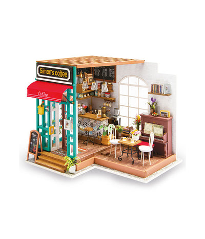 Cafetería en miniatura Simon’s Coffee completa sobre fondo blanco.