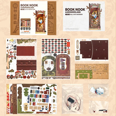 Caja, instrucciones, paneles y componentes del kit Fall into Wonder extendidos.